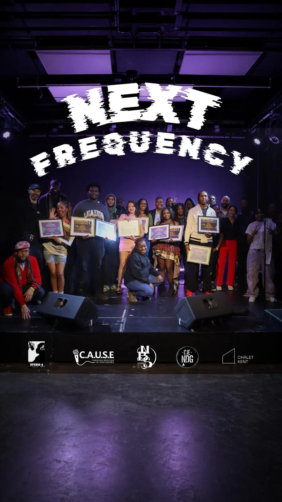 The Next Frequency cohort and program team gather on stage